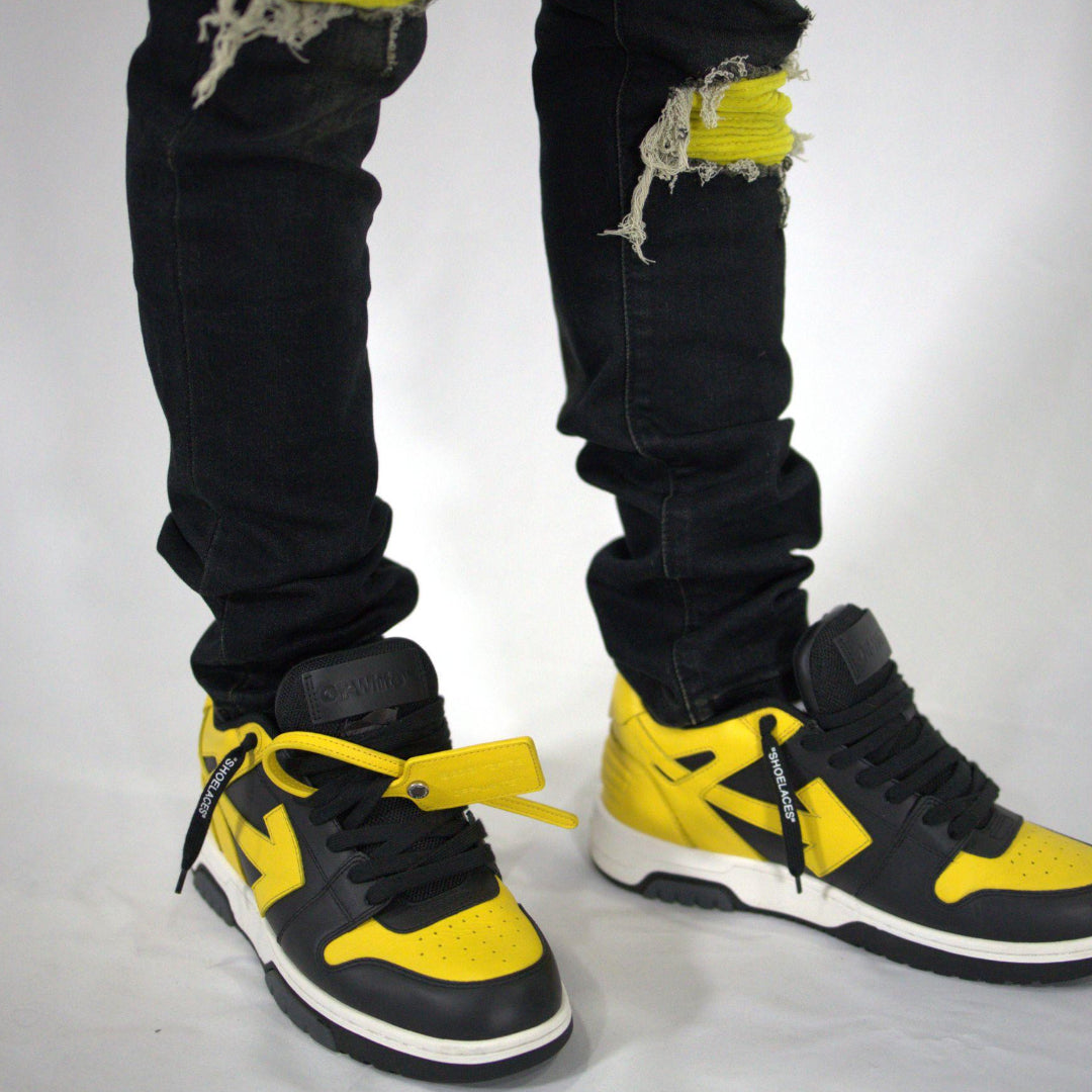 Yellow ripped jeans